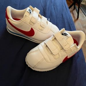 A pair of Cortez Nikes size 9c and blk graco jogger stroller 80$ for the strolle